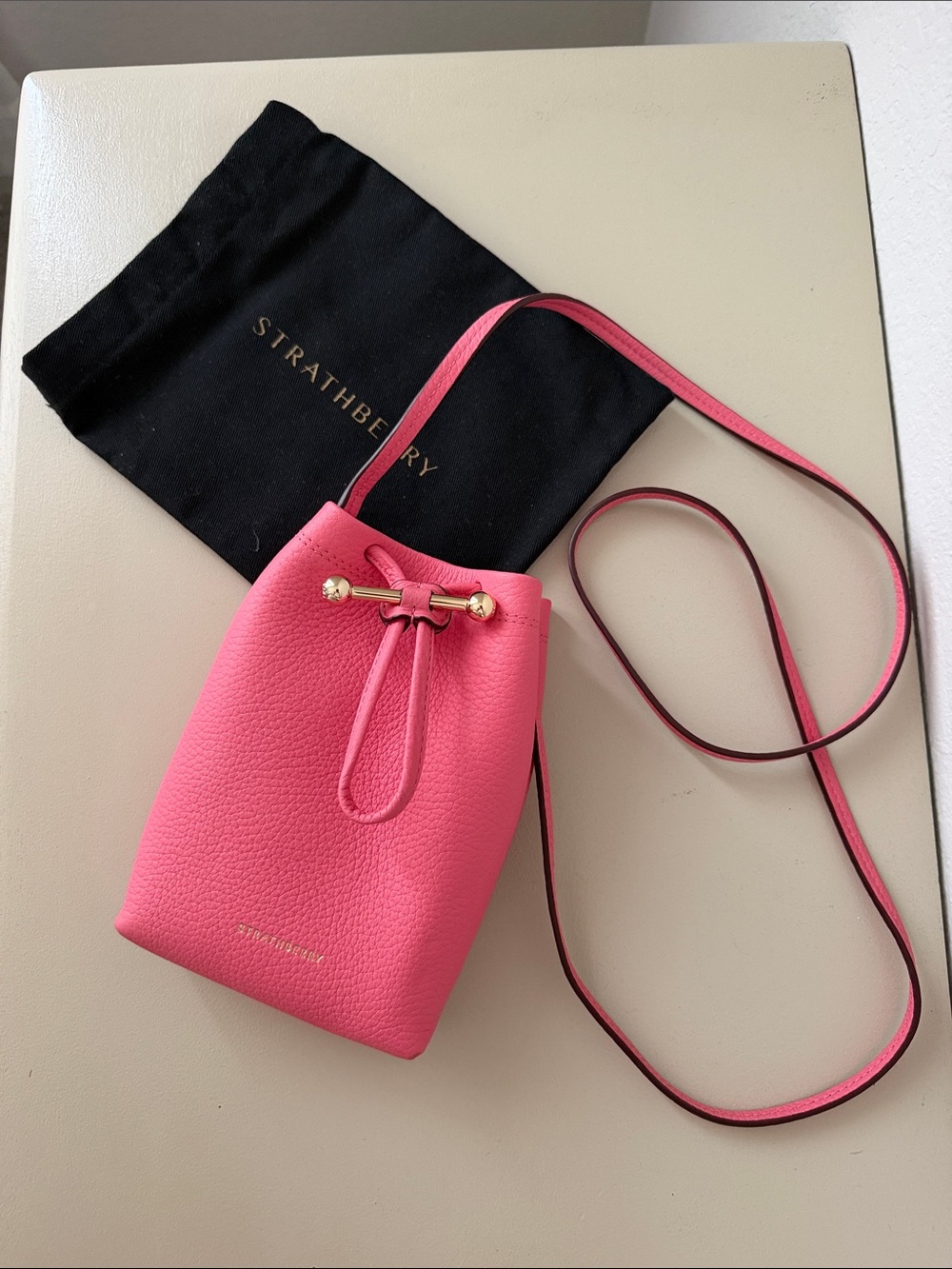 Strathberry Pink Pebbled Leather Drawstring Crossbody